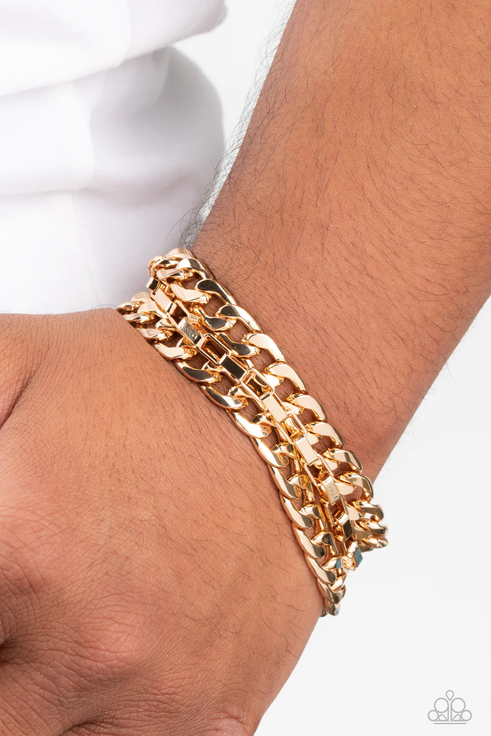 Paparazzi Accessories Heavy Duty - Gold Glistening gold curb and box chains wrap around the wrist for a grungy, industrial look. Features an adjustable clasp closure. Sold as one individual bracelet. Jewelry