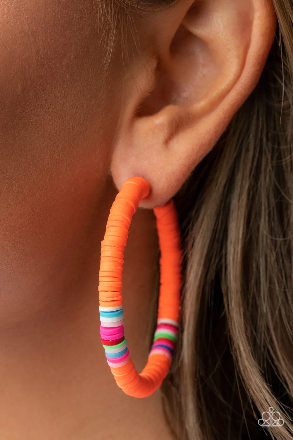 Paparazzi Accessories Colorfully Contagious - Orange Rubbery orange, white, pink, blue, green, and red bands are threaded along an oversized silver hoop, creating a courageous pop of color. Earring attaches to a standard post fitting. Hoop measures approx
