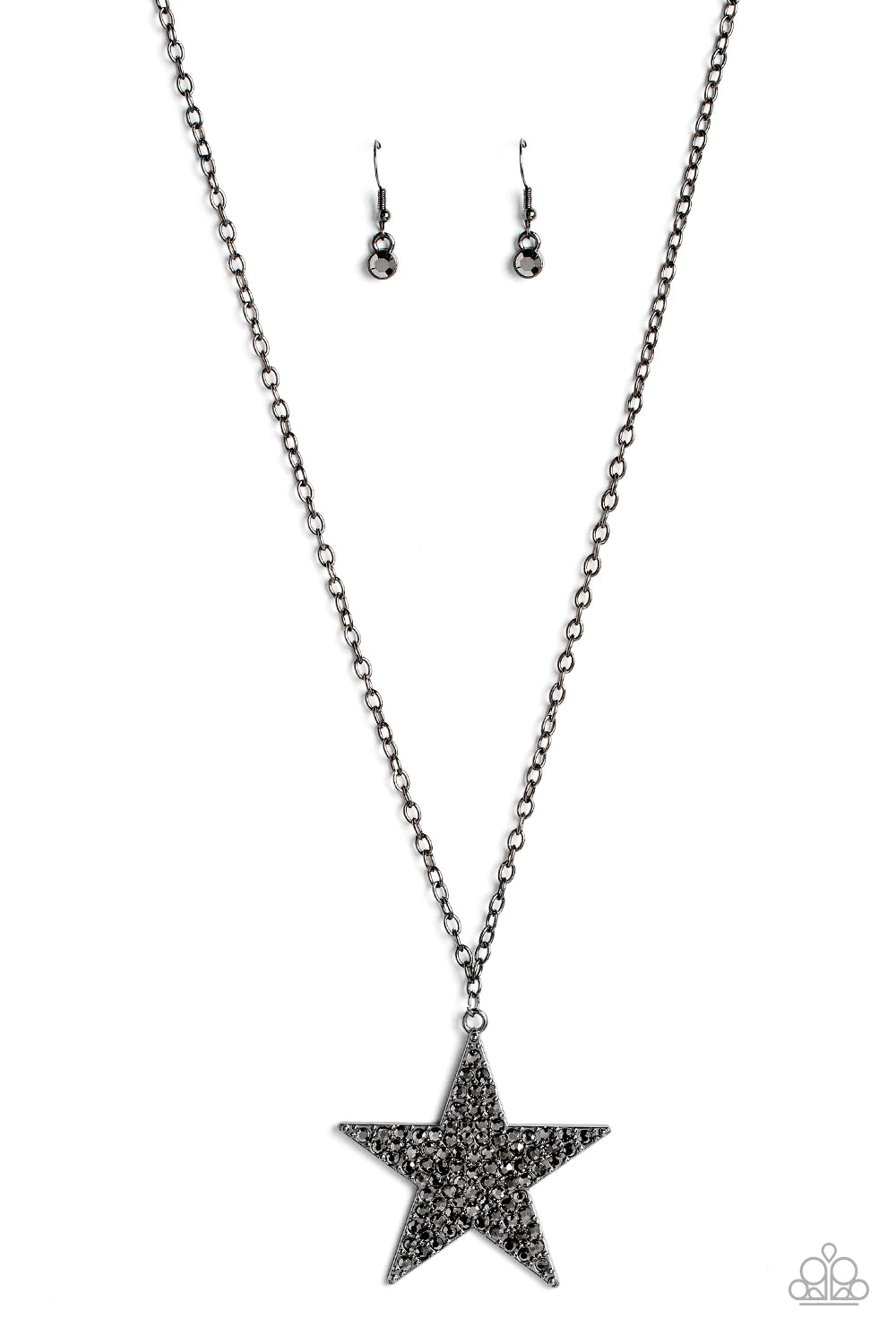 Paparazzi Accessories Rock Star Sparkle - Black The front of an oversized gunmetal star is encrusted in smoldering hematite rhinestones, resulting in a stellar pendant at the bottom of a lengthened gunmetal chain. Features an adjustable clasp closure. Sol