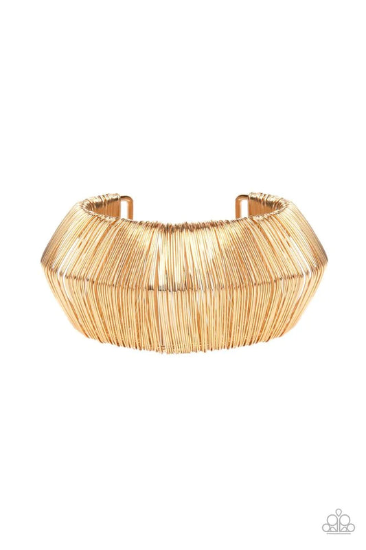 Paparazzi Accessories Wild About Wire - Gold Layer after layer of glistening gold wire wraps around an oversized gold cuff. The center of the wire wrap comes to a peak, adding edge to the intense industrial display. Jewelry