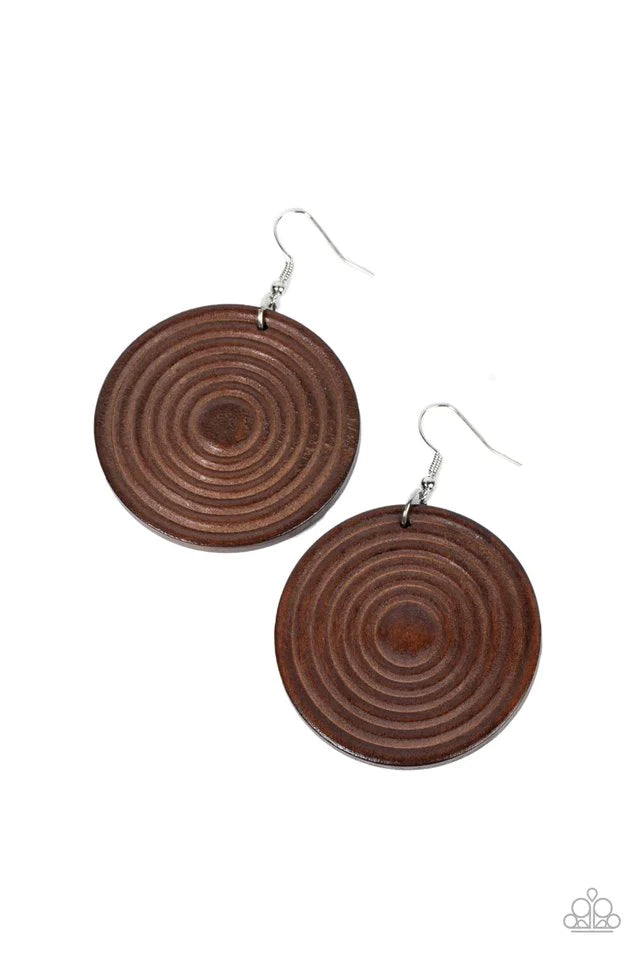 Paparazzi Accessories Caribbean Cymbal - Brown A shiny brown wooden disc is engraved in circular details, resulting in a dizzying pop of color. Earring attaches to a standard fishhook earring. Jewelry