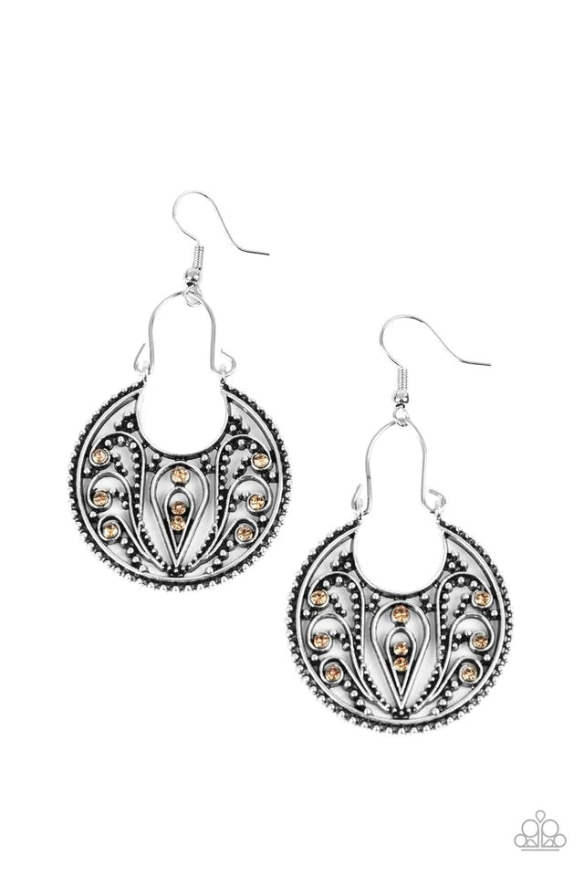 Paparazzi Accessories Vineyard Villa - Brown Dotted with golden topaz rhinestones, a studded crescent shaped frame is filled with vine-like filigree as it swings from a dainty silver wire fitting for a whimsical flair. Earring attaches to a standard fishh
