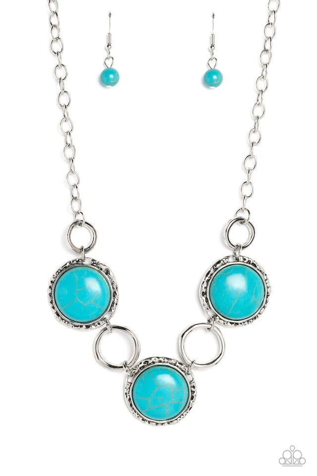 Paparazzi Accessories Saharan Scope - Blue Warped silver hoops in varying sizes alternate along hammered silver frames. Pressed into the hammered frames, oversized turquoise stones add a vibrant, earthy flair to the summery palette. Features an adjustable