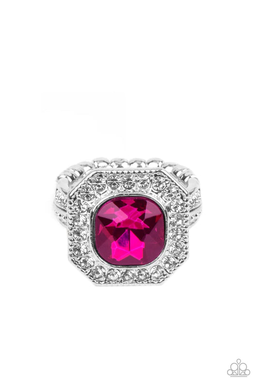 Paparazzi Accessories Title Match - Pink Bordered in a sparkly silver frame of glassy white rhinestones, an oversized pink gem adorns the finger for a timeless finish. Features a dainty stretchy band for a flexible fit. Sold as one individual ring. Jewelr