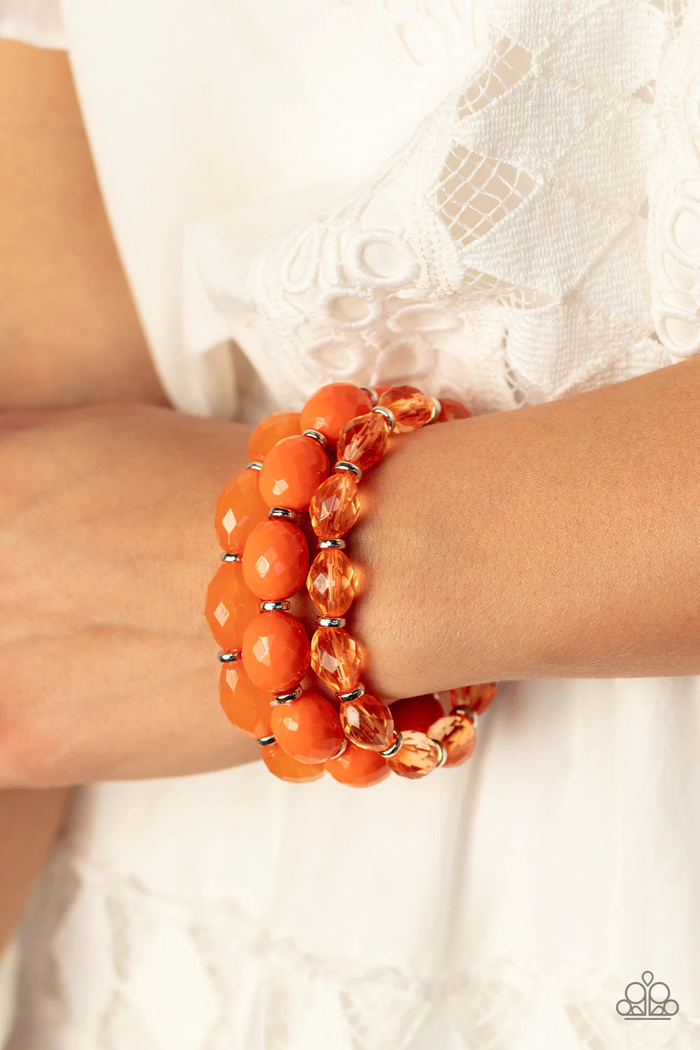 Paparazzi Accessories High Tide Hammock - Orange Separated by dainty silver rings, mismatched rows of glassy, opaque, and solid orange acrylic crystal-like beads are threaded along stretchy bands around the wrist, creating vivacious layers. Jewelry