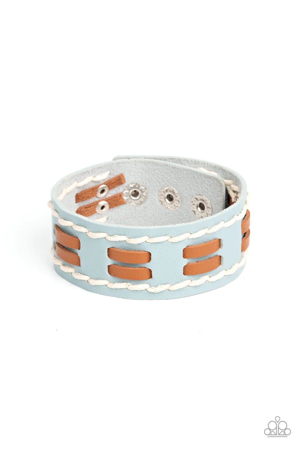 Paparazzi Accessories In the FRONTIER Running - Blue Flanked with white stitched rows, two rows of brown leather laces are threaded through the center of a blue leather band for a rustic pop of color around the wrist. Features an adjustable snap closure.