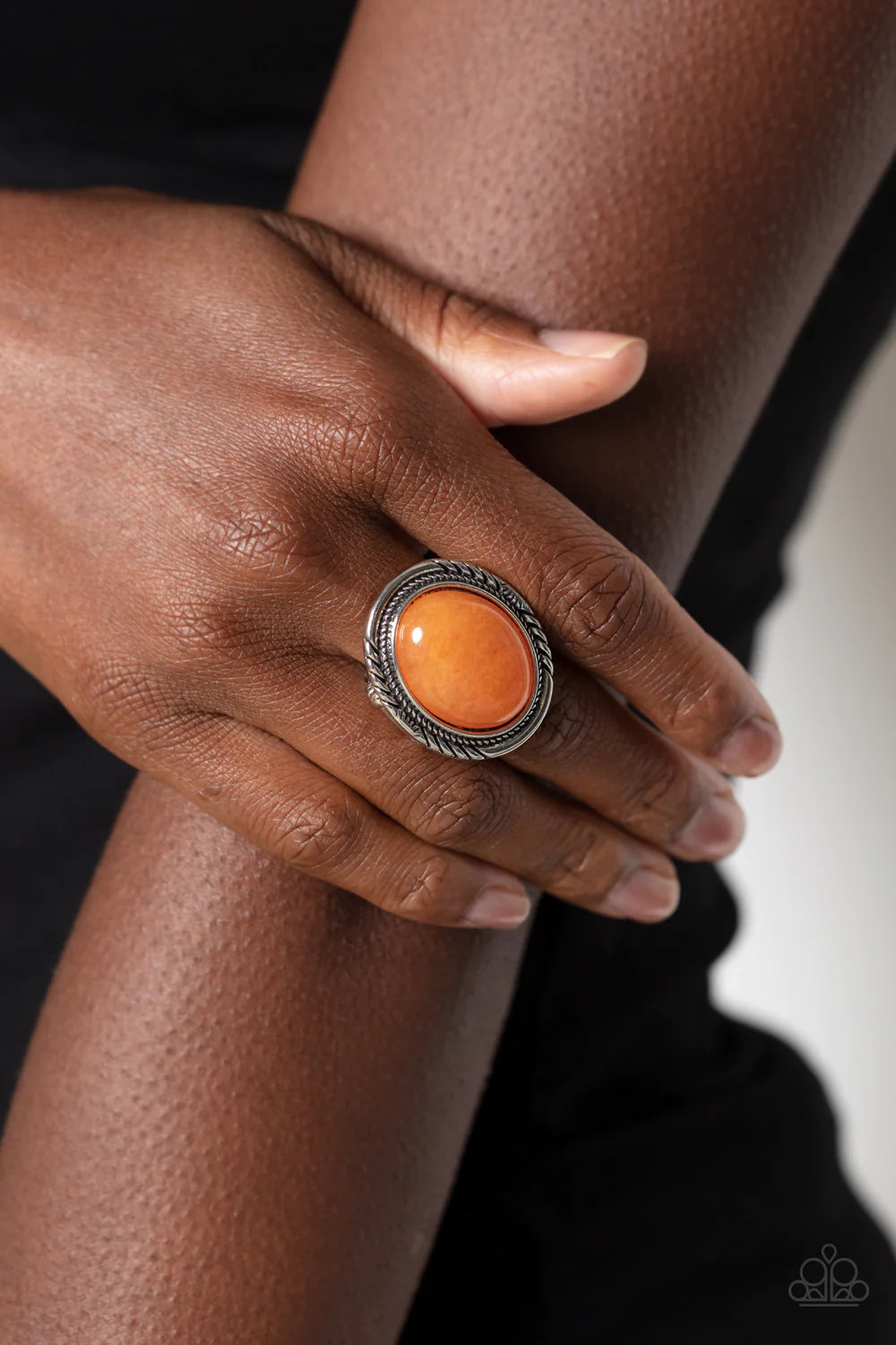 Paparazzi Accessories Stone Terrarium - Orange A glassy orange stone is nestled inside a textured silver frame, creating a mystical stone centerpiece atop the finger. Features a stretchy band for a flexible fit. As the stone elements in this piece are nat