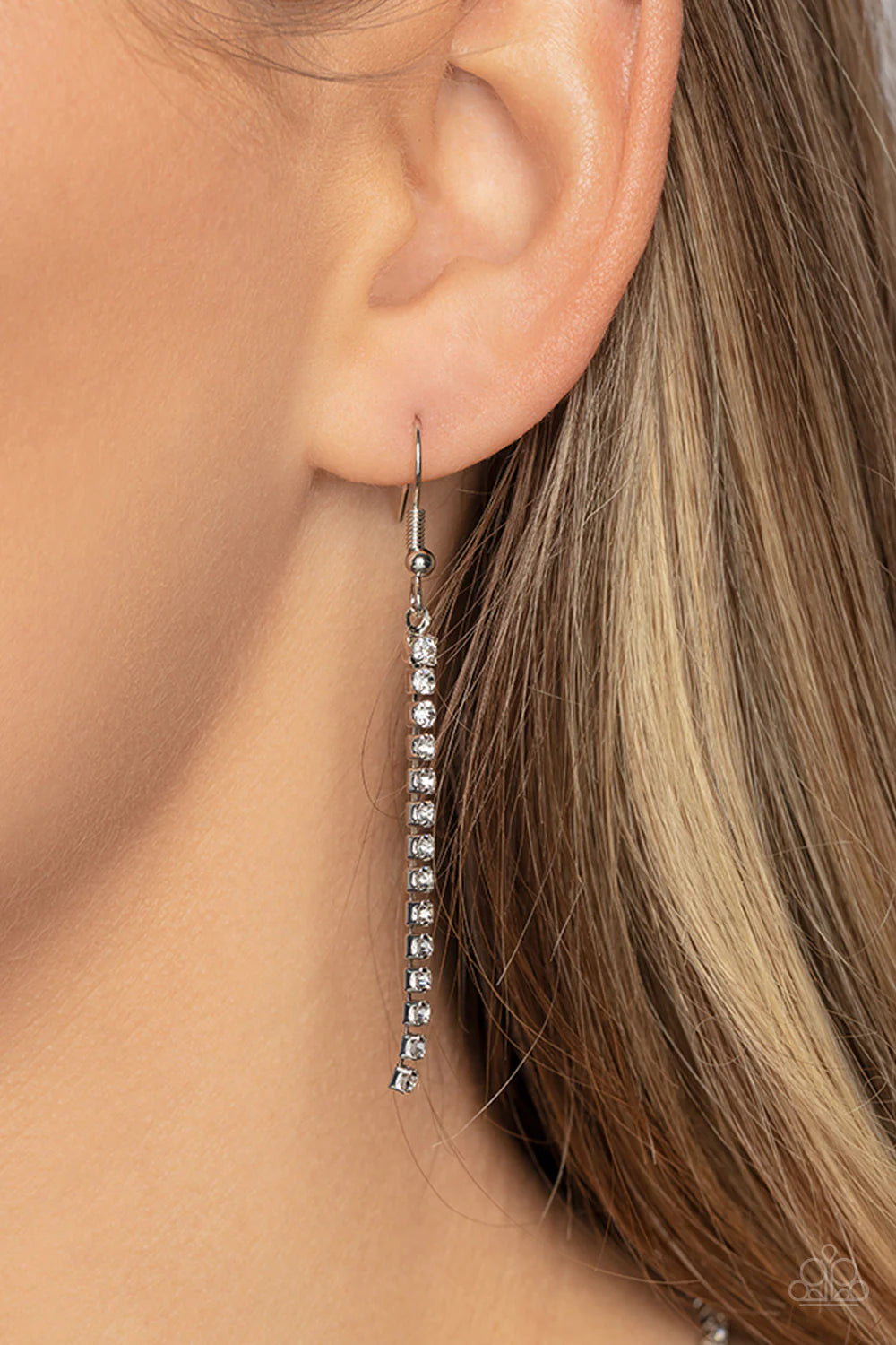 Paparazzi Accessories Infinitely Icy - White Strands of glassy white rhinestones delicately loop into interlocking infinities below the collar, drizzling into an icy extended pendant for a statement-making finish. Features an adjustable clasp closure. Sol