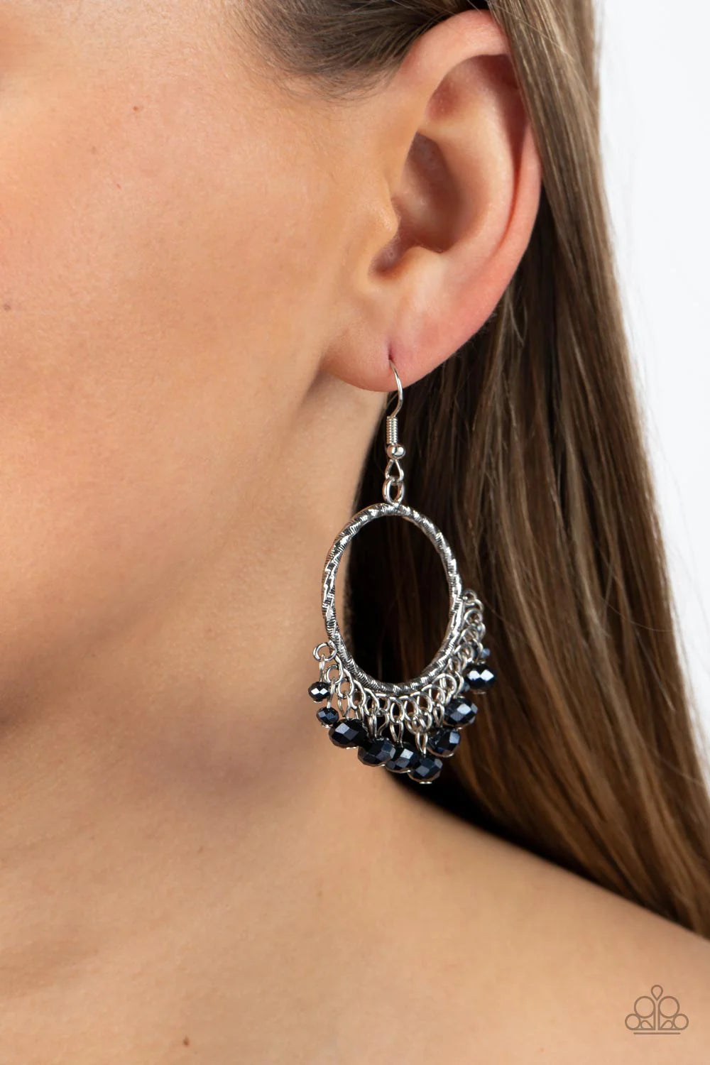Paparazzi Accessories As if by Magic - Blue Dainty metallic blue crystal-like beads sparkle at the bottom of a textured silver hoop, resulting in a glittery fringe. Earring attaches to a standard fishhook fitting. Sold as one pair of earrings. Jewelry
