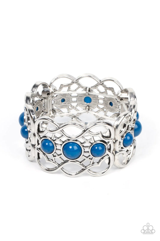 Paparazzi Accessories Very Versailles - Blue A trio of bubbly Mykonos Blue beads adorn the centers of vine-like silver frames that are threaded along a stretchy band around the wrist, creating a whimsical centerpiece. Sold as one individual bracelet. Jewe
