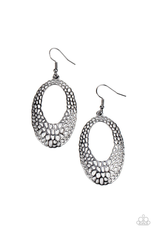 Paparazzi Accessories The HOLE Nine Yards - Black Stenciled in an asymmetrical hole pattern, a gunmetal oval frame swings from the ear for an abstract fashion. Earring attaches to a standard fishhook fitting. Sold as one pair of earrings. Jewelry