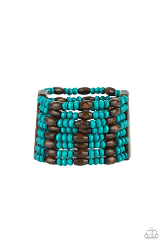 Paparazzi Accessories Tropical Nirvana - Blue Held together with brown wooden rectangular frames, mismatched rows of oval brown and round blue wooden beads are threaded along stretchy bands around the wrist for a whimsically layered look. Jewelry