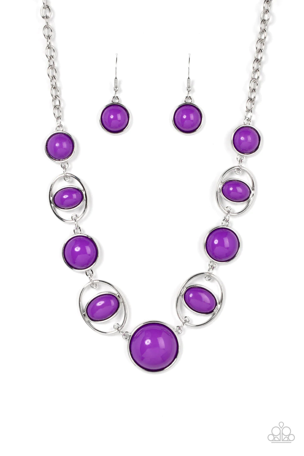 Paparazzi Accessories Eye of the BEAD-holder - Purple Encased in sleek silver frames, a bubbly collection of oversized purple beads alternate with oval purple beaded hoops below the collar for a bodacious pop of color. Features an adjustable clasp closure