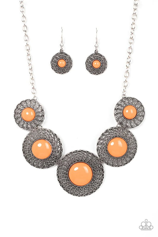 Paparazzi Accessories Detail Oriented - Orange Dotted with bubbly orange beads, silverdiscs spinning with swirly petal motifs gradually increase in size as they link below the collar for a statement-making floral fashion. Features an adjustable clasp clos