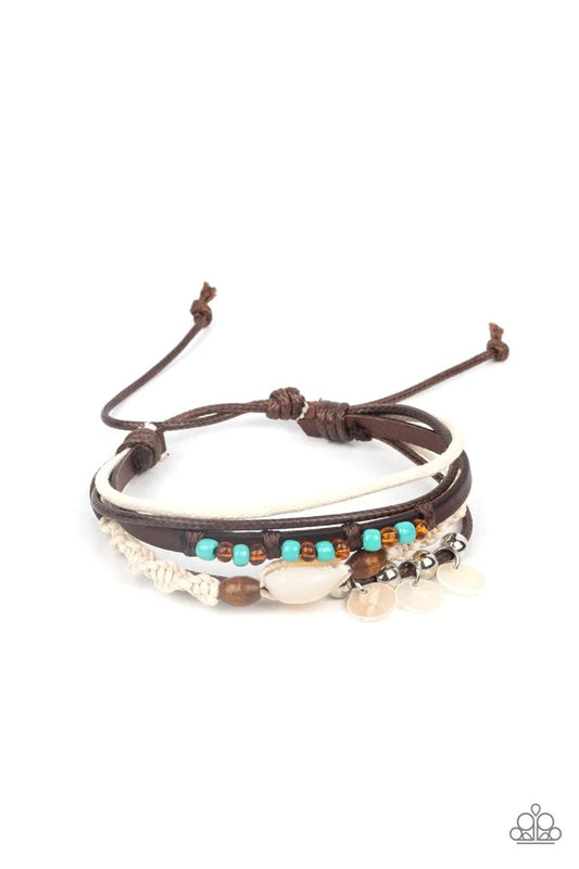 Paparazzi Accessories Tidal Dream - Blue An assortment of colorful seed beads, white shells, and earthy wooden accents adorns mismatched strands of leather and colorful cording around the wrist for a summery vibe. Features an adjustable sliding knot closu