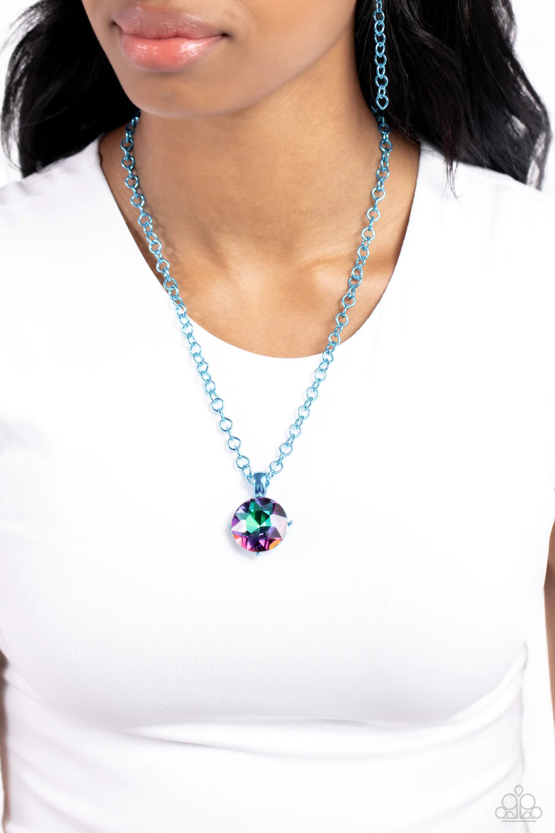 Paparazzi Accessories Las Vegas Dip - Blue Featuring a classic elongated chain in a vibrant blue hue, an oversized UV pendant in blue pronged fittings shimmers down the chest for a charismatic finish. Features an adjustable clasp closure. Sold as one indi