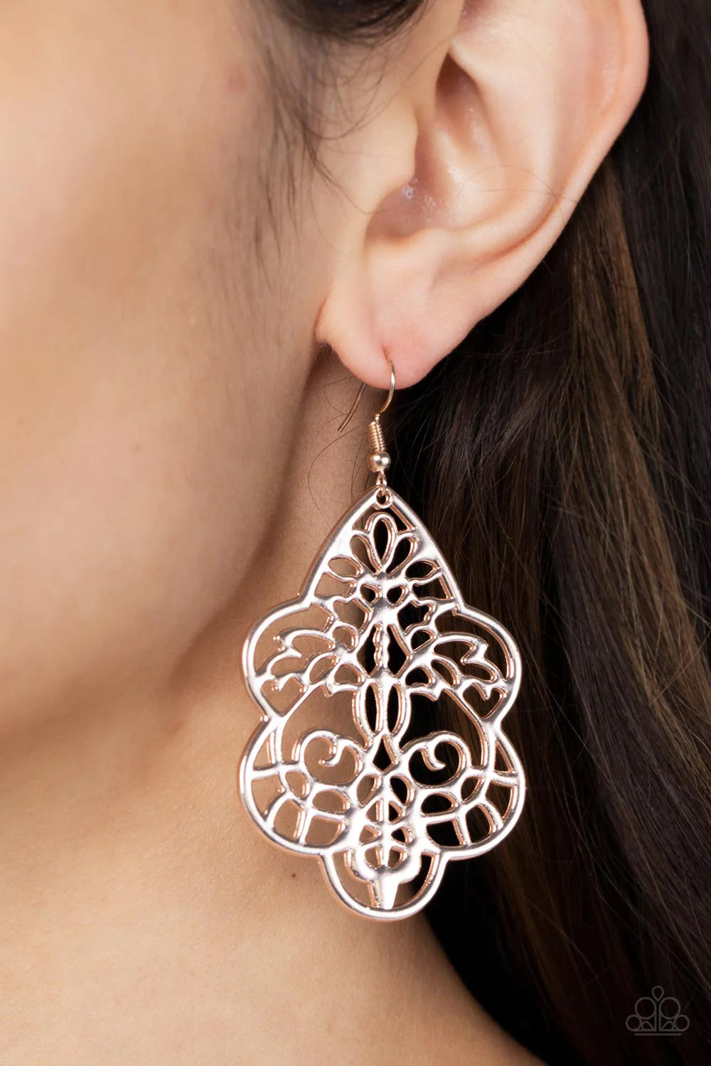 Paparazzi Accessories Festive Foliage - Rose Gold Brilliant rose gold floral filigree designs permeate a bohemian style scalloped frame resulting in a mystical lure. Earring attaches to a standard fishhook fitting. Sold as one pair of earrings. Jewelry