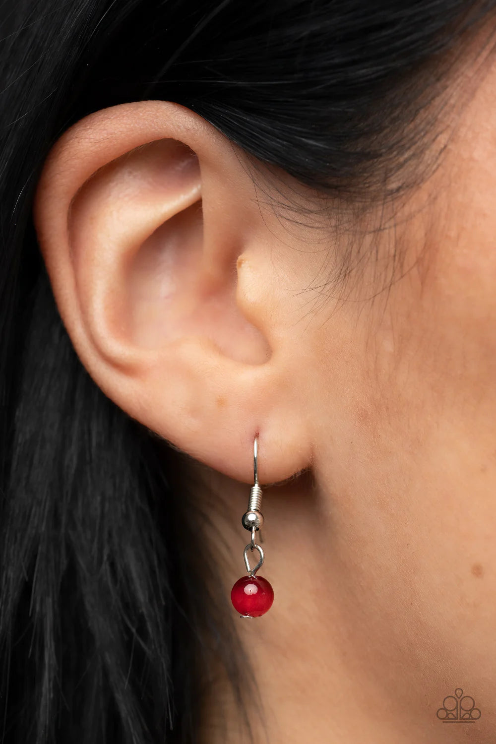 Paparazzi Accessories Epicenter Elegance - Red An oval red cat's eye stone attaches to the top of silver rings that ripple out into a dizzying pendant at the bottom of an extended silver chain, resulting in a mystical pop of color. Features an adjustable