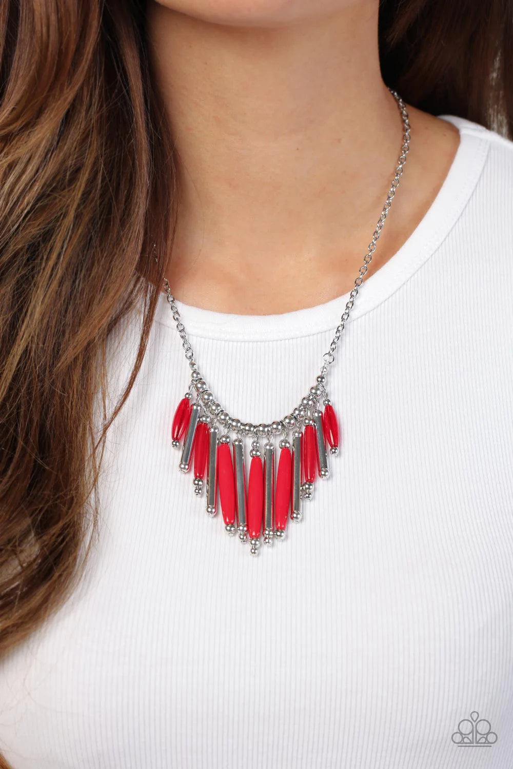 Paparazzi Accessories Bohemian Breeze - Red Flanked by dainty silver beads, cylindrical silver and glassy and opaque red beads alternate along a silver beaded chain, fanning out into a colorful fringe below the collar. Features an adjustable clasp closure