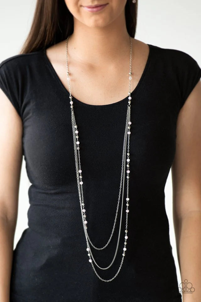 Paparazzi Accessories Colorful Cadence - Pink Faceted silver and glassy pink beads trickle along shimmery silver chains down the chest for a whimsical look. Features an adjustable clasp closure. Sold as one individual necklace. Includes one pair of matchi