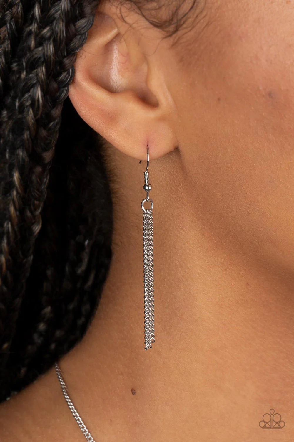 Paparazzi Accessories Shimmering Seafloors - Yellow Featuring a shell-like iridescence, shimmery flecks are sprinkled along a mustard yellow backdrop inside of a glassy casing. The colorful teardrop swings from the bottom of an extended silver chain, crea