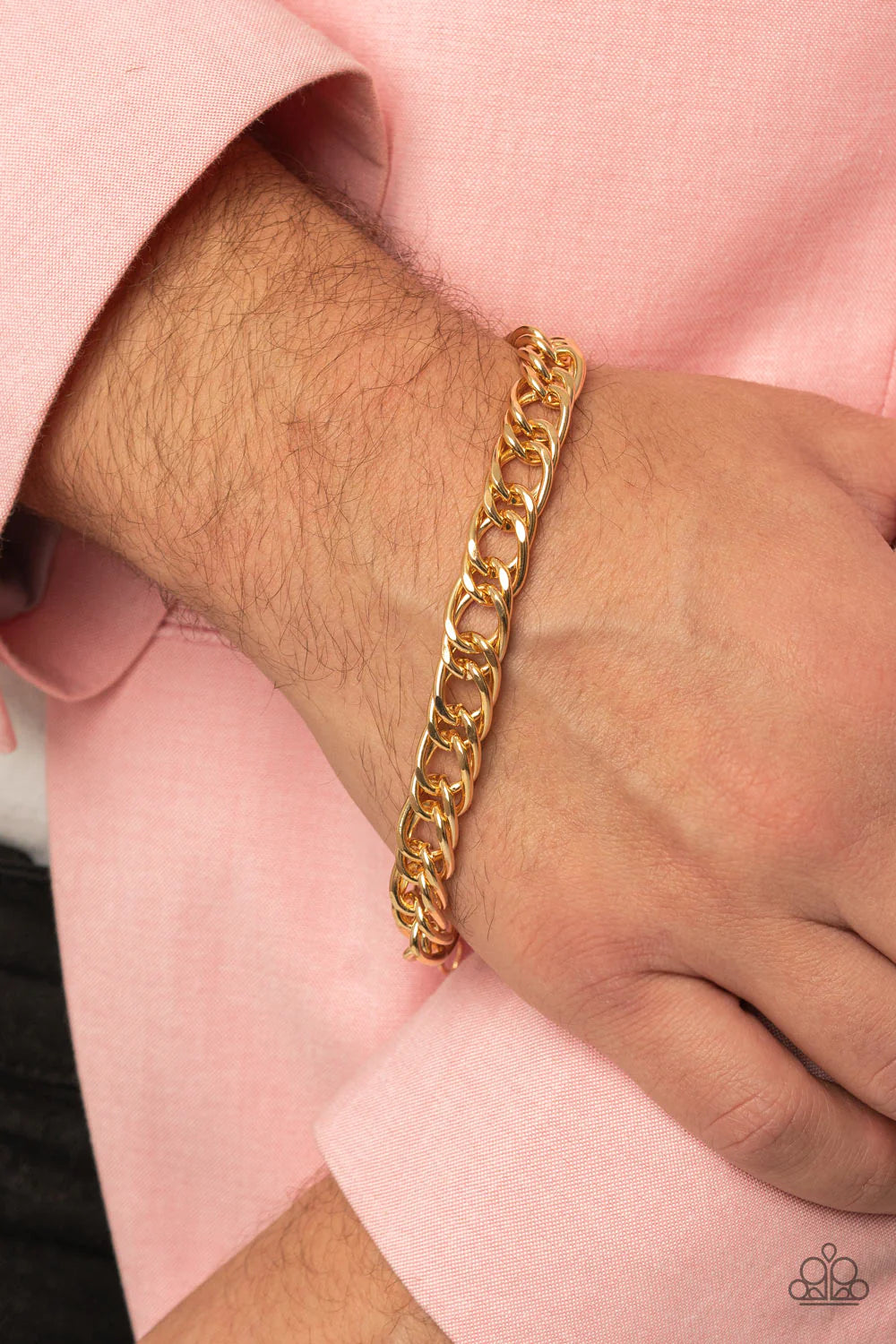 Paparazzi Accessories Game-Changing Couture - Gold Featuring oversized oval links, a shiny gold chain drapes around the wrist for a bold industrial look. Features an adjustable clasp closure. Sold as one individual bracelet. Jewelry