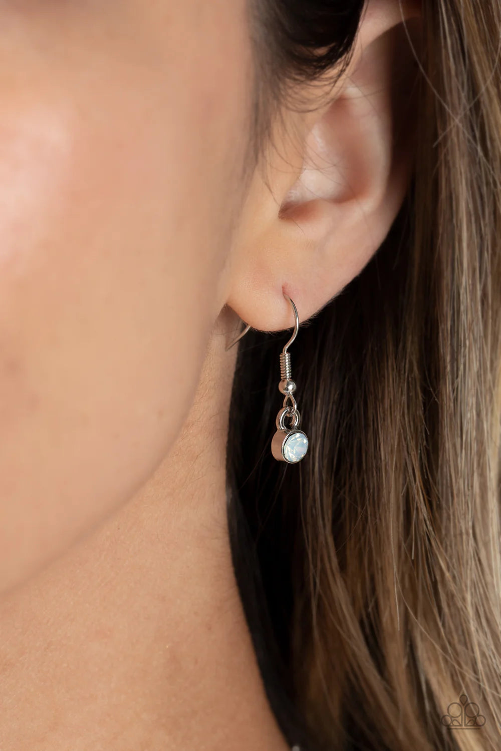 Paparazzi Accessories Pearly Pond - White Encased in shimmery silver frames, a collection of white, opalescent, teardrop gems twinkles above the collar. Dainty white pearls, white crystal-like gems, and white rhinestones surround each teardrop, amplifying