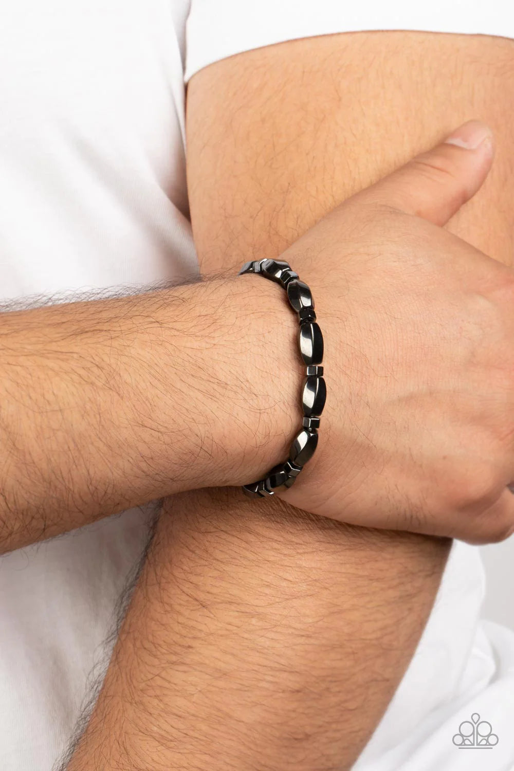 Paparazzi Accessories Magnetic Mantra - Black Faceted gunmetal beads and hexagonal rings alternate along stretchy bands around the wrist, resulting in a gritty centerpiece. Sold as one individual bracelet. Jewelry
