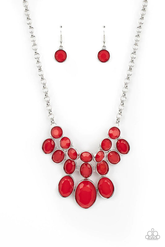 Paparazzi Accessories Delectable Daydream - Red A decadent collection of faceted red beads gradually increase in size as they fall into a tapered display. The smallest round beads anchor the design, with the rows underneath them slowly elongating into ove