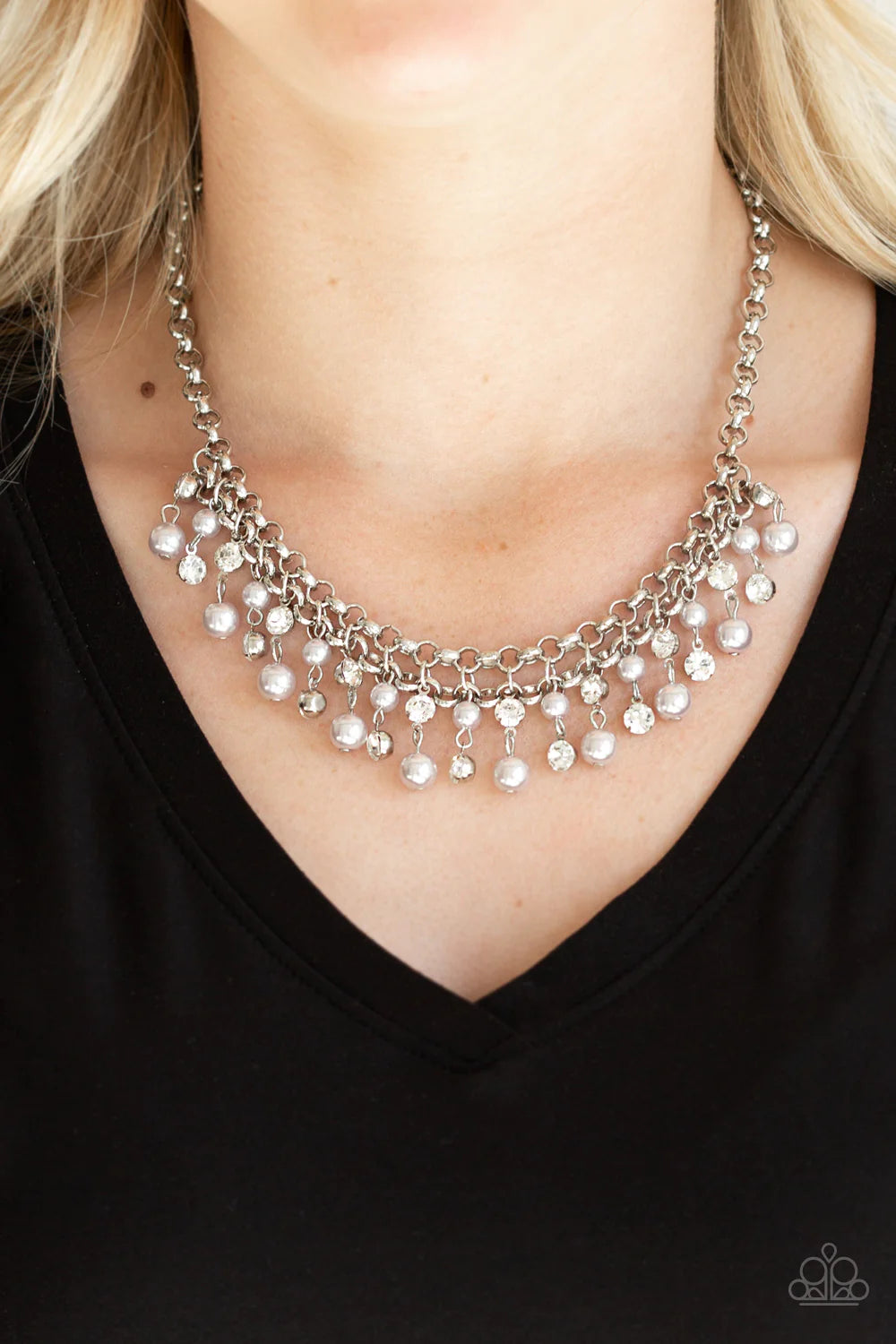 Paparazzi Accessories You MAY Kiss The Bride - White Glittery white rhinestones and classic silver pearls swing from the bottom of interlocking silver chains, creating a bubbly fringe below the collar. Features an adjustable clasp closure. Sold as one ind