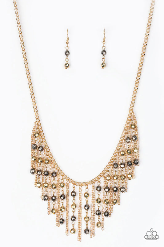 Paparazzi Accessories Rebel Remix - Multi Stands of faceted gold and gunmetal beads and glistening gold chains stream from a matching gold chain, creating an edgy fringe below the collar. Features an adjustable clasp closure. Sold as one individual neckla