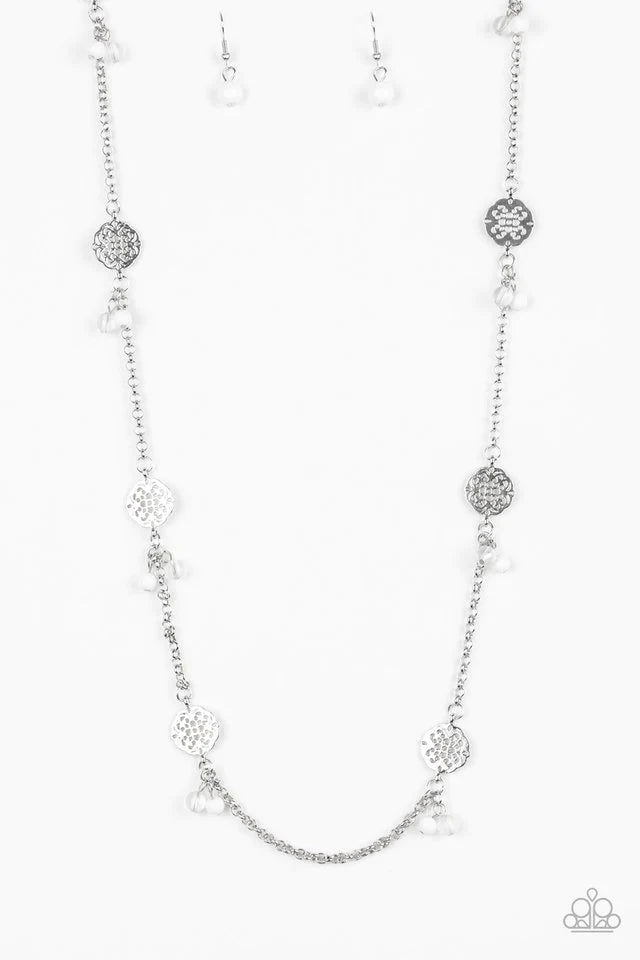 Paparazzi Accessories Color Boost - White Featuring glassy and polished finishes, dainty white beads join ornate silver frames along a shimmery silver chain for a whimsical look. Features an adjustable clasp closure. Sold as one individual necklace. Inclu