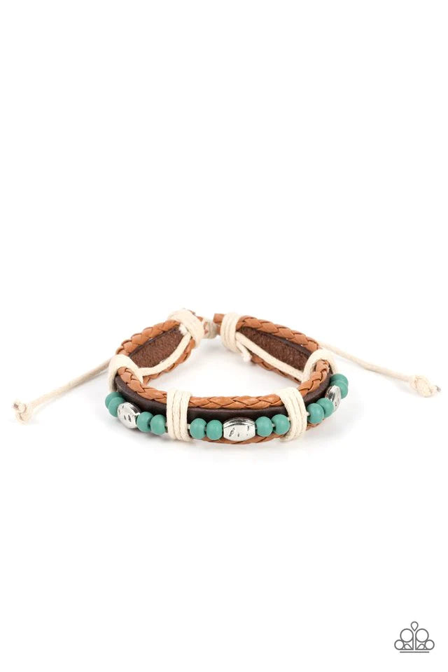 Paparazzi Accessories Lodge Luxe - Blue Blue wooden beads and textured silver accents are threaded along a natural cord atop a dark brown leather band. Light brown braided leather bands create a border as the collection is wrapped in sections with natural