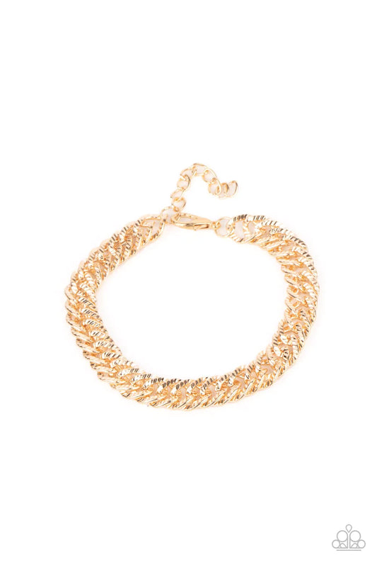 Paparazzi Accessories On The Up and UPPERCUT - Gold Etched in linear textures, an oversized gold chain drapes around the wrist for a dramatic industrial effect. Features an adjustable clasp closure. Sold as one individual bracelet.
