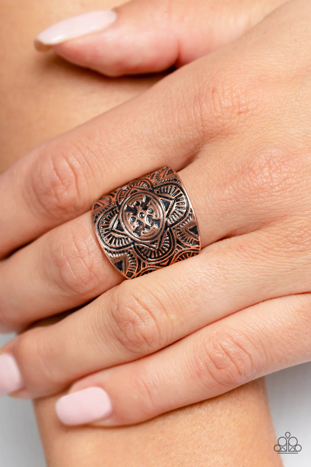 Paparazzi Accessories Argentine Arches - Copper Engraved geometric shapes, lines, and patterns fill a copper plate that curves around the finger, creating a trendy centerpiece. Features a stretchy band for a flexible fit. Sold as one individual ring. Jewe