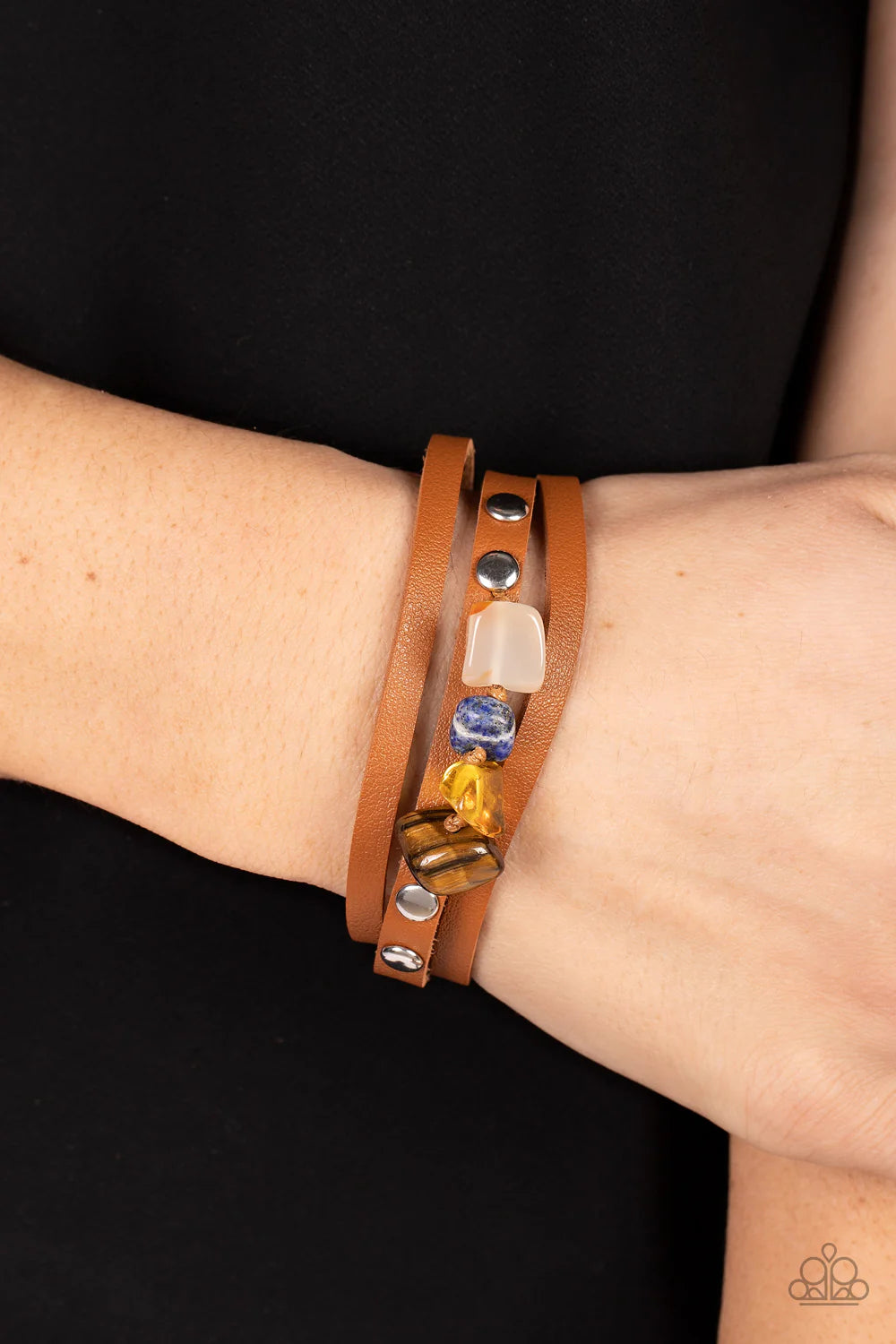 Paparazzi Accessories Creek Cache - Multi Chunks of tiger's eye, citrine, lapis lazuli and quartz stones are threaded along a knotted cord that is studded in place along the center band of a layered leather bracelet for a seasonal finish. Features an adju