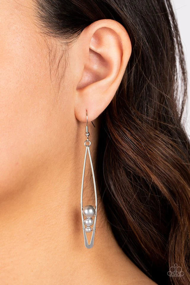 Paparazzi Accessories Atlantic Allure - Silver Threaded along dainty silver wires, shimmery gray pearls decrease in size as they tumble down the bottom of an elongated silver frame for a modern twist. Earring attaches to a standard fishhook fitting. Jewel