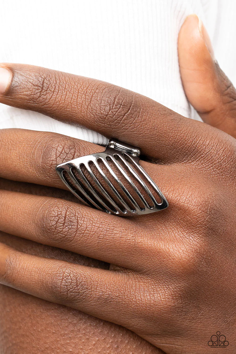 Paparazzi Accessories I Just Need to Vent - Black Featuring rows of linear stenciled cutouts, a gunmetal diamond shaped frame curls around the finger, allowing the skin to peek through the vented pattern for a natural finish. Features a stretchy band for