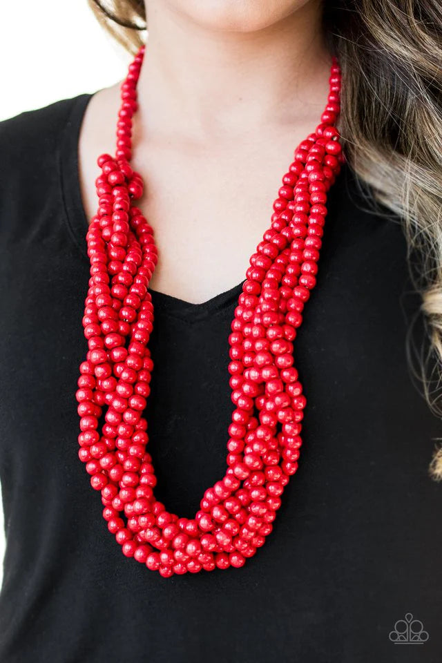 Paparazzi Accessories Tahiti Tropic - Red Brushed in a fiery red finish, strands of vivacious wooden beads subtly twist across the chest for a summery look. Sold as one individual necklace. Includes one pair of matching earrings. Jewelry