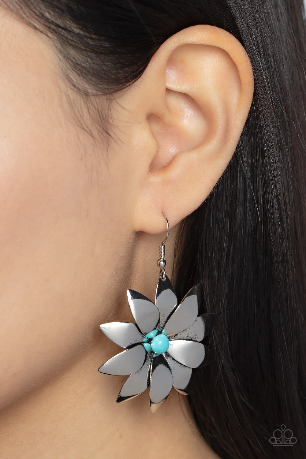 Paparazzi Accessories Pinwheel Prairies - Blue Overlapping silver petals bloom from a turquoise stone beaded center as they gently curve into a pinwheel-like flower, resulting in a seasonal pop of color. Earring attaches to a standard fishhook fitting. So