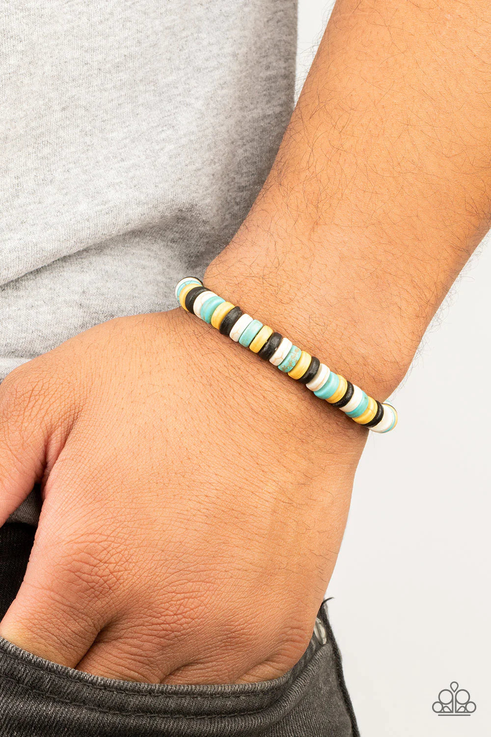 Paparazzi Accessories Rural Rocker - Blue Imperfect black, yellow, turquoise, and white stone discs are threaded along stretchy bands, creating an earthy pop of color around the wrist. Sold as one individual bracelet. Jewelry
