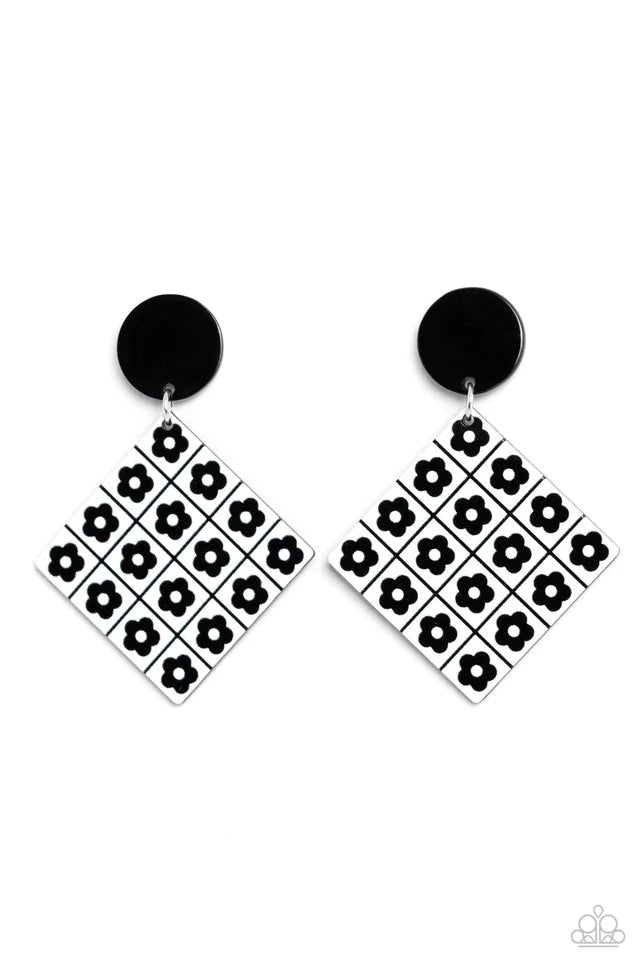 Paparazzi Accessories Vintage Vaudeville - Black Featuring a monochrome floral arrangement, black flowers are symmetrically arranged on a white square-cut acrylic frame for a high-fashion statement at the ear. The floral feature swings from a solid black