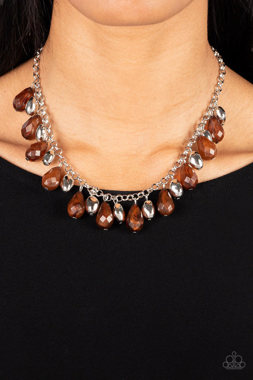 Paparazzi Accessories Summertime Tryst - Brown Featuring a faceted shimmer, opaque brown teardrop beads alternate with imperfect silver beads along a classic silver chain, swaying into a colorful fringe below the collar. Features an adjustable clasp closu