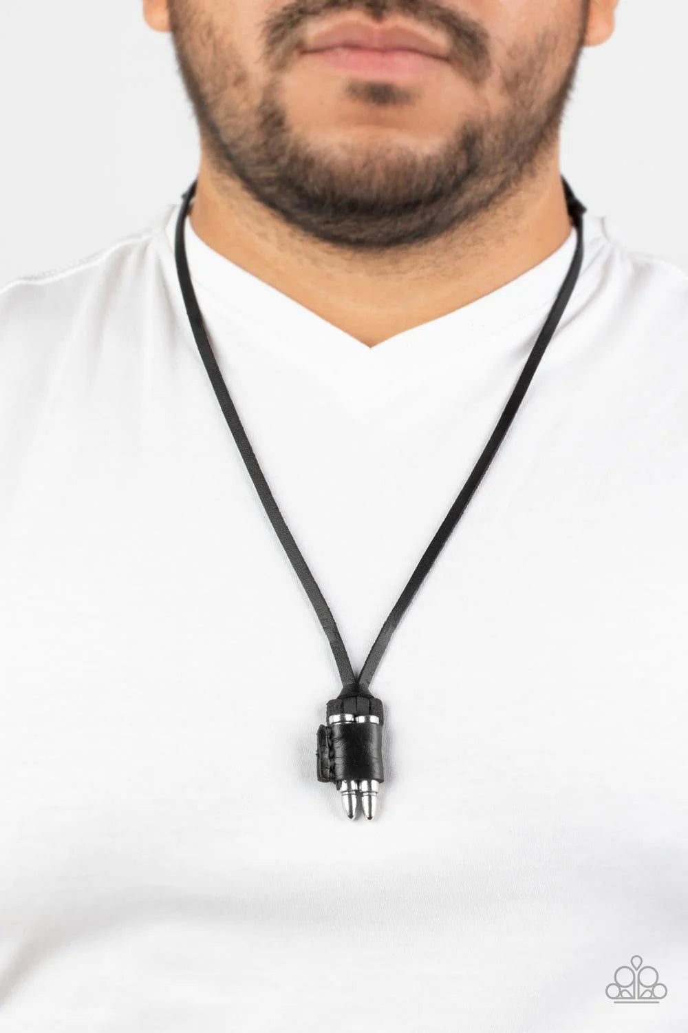 Paparazzi Accessories On the Lookout - Black A piece of black leather wraps around a pair of silver bullets, creating an edgy urban pendant at the bottom of knotted strands of black leather. Features an adjustable sliding knot closure. Sold as one individ