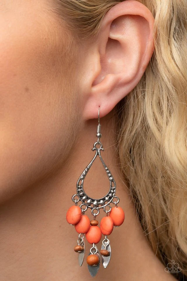Paparazzi Accessories Adobe Air - Orange An earthy assortment of burnt orange stones, wooden beads, and rustic silver frames cascade from the bottom of a studded silver teardrop, resulting in an artisan inspired fringe. Earring attaches to a standard fish