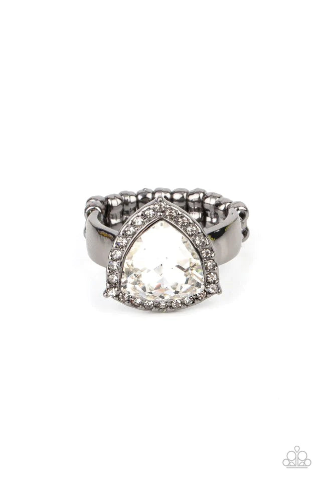 Paparazzi Accessories Tour De Timeless - Black An oversized trilliant cut white rhinestone encased in a sparkling rhinestone-encrusted gunmetal frame steals the spotlight and creates an eye-catching stunner atop the finger. Fea Jewelry