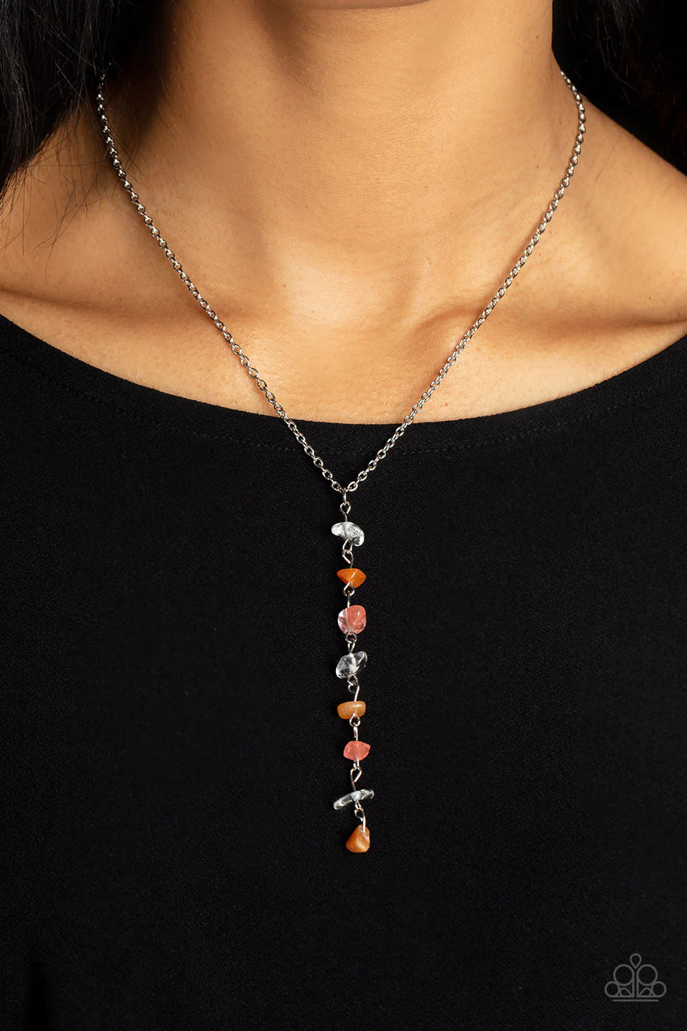 Paparazzi Accessories Tranquil Tidings - Orange A dainty stack of quartz, citrine, and rose quartz pebbles trickles from the bottom of a classic silver chain, creating a tranquil extended pendant down the chest. Features an adjustable clasp closure. As th