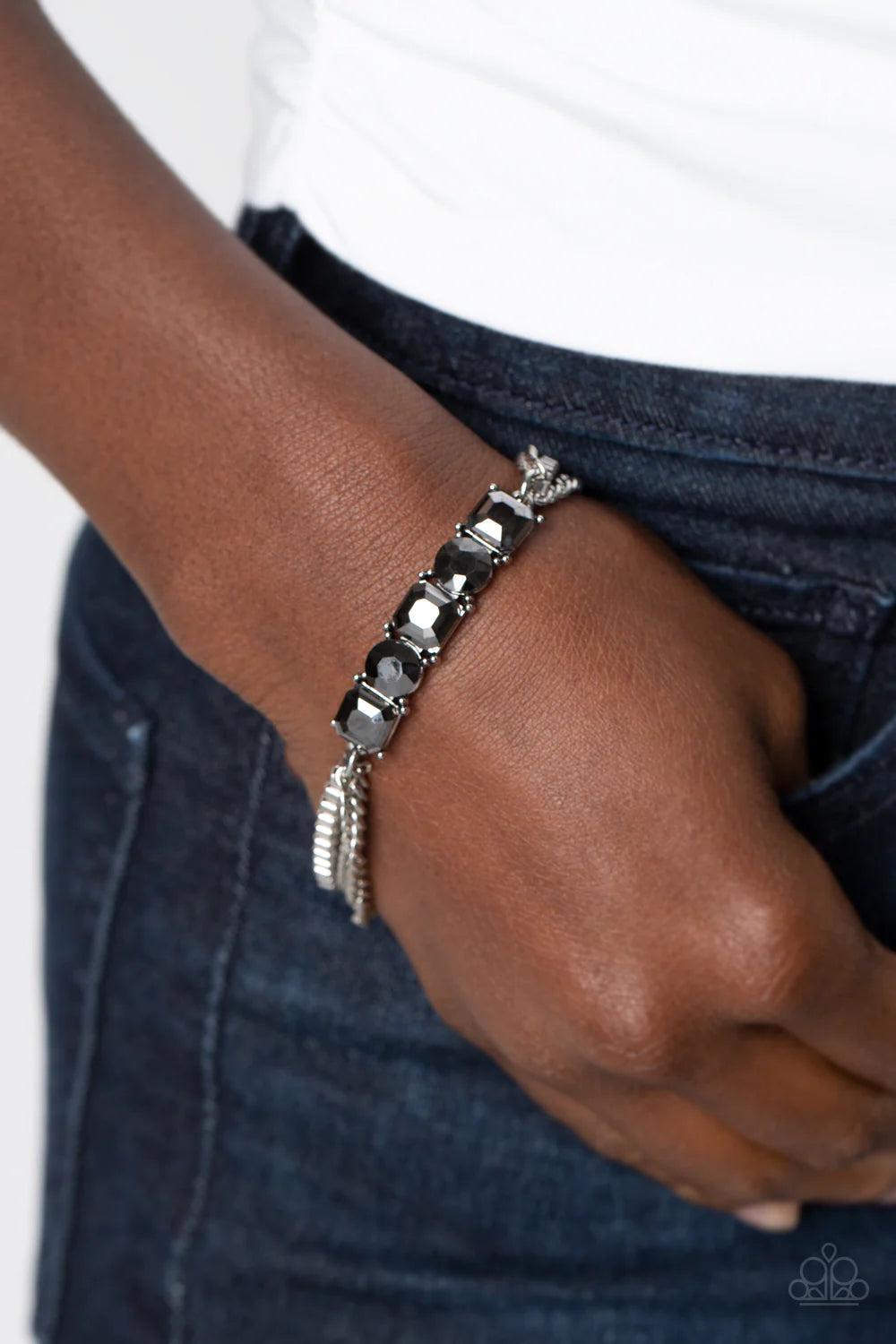 Paparazzi Accessories Tyrant Treasure - Silver A gritty mix of classic silver and silver box-chains stem from a row of faceted hematite, pressed into circular and square silver frames, creating edgy layers around the wrist. Features an adjustable clasp cl