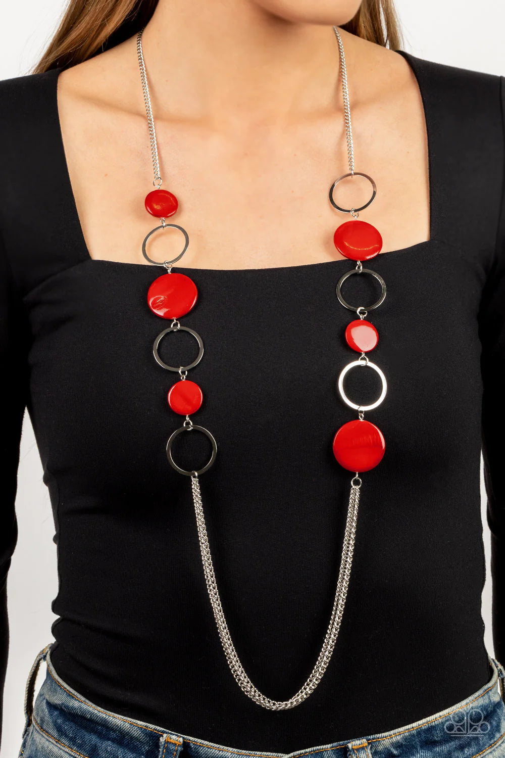 Paparazzi Accessories Beach Hub - Red Sections of Fiery Red shell-like discs link with flat silver hoops down the chest, giving way to layers of shimmery silver chain for a tropical inspired flair. Features an adjustable clasp closure. Sold as one individ