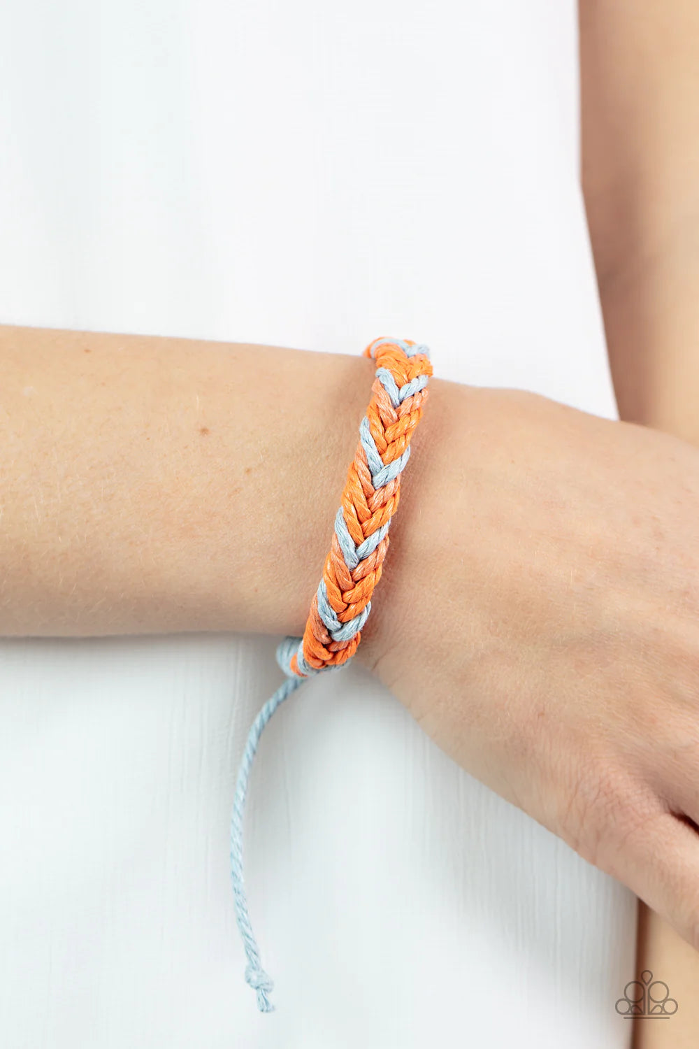 Paparazzi Accessories Born to Travel - Multi Blue, orange and coral cording decoratively weaves around the wrist, knotting into a colorful braid for an adventurous vibe. Features an adjustable sliding knot closure. Sold as one individual bracelet. Jewelry